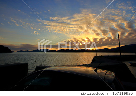Park your car on the beach and take a breather while watching the beautiful sunset. 107119959