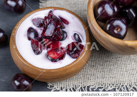 fresh cow's milk yogurt with cherry berries, dairy products 107120917