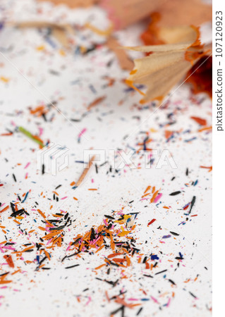 shavings and pieces of lead on paper after sharpening pencils shavings and pieces of lead on paper after sharpening pencils 107120923
