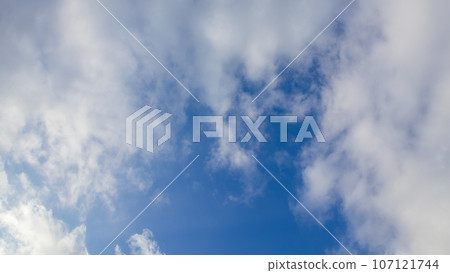 White clouds flowing in the afternoon blue sky White clouds flowing in the afternoon blue sky 107121744