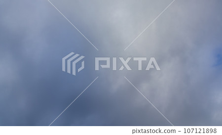 white clouds flowing in the afternoon sky white clouds flowing in the afternoon sky 107121898