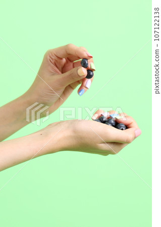 Hand with Fruit 107122138