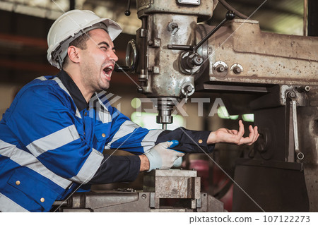 Worker serious accident arm injury from old unsafety machine in heavy industry workplace shout need urgent help Worker serious accident arm injury from old unsafety machine in heavy industry workplace shout need urgent help 107122273
