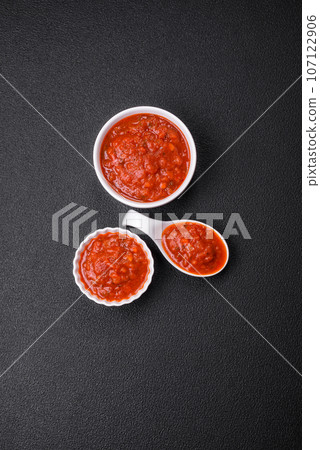 Delicious red Napoletana sauce with onions, salt, spices and herbs Delicious red Napoletana sauce with onions, salt, spices and herbs 107122906