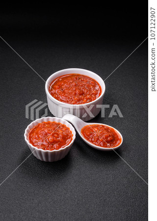 Delicious red Napoletana sauce with onions, salt, spices and herbs Delicious red Napoletana sauce with onions, salt, spices and herbs 107122907