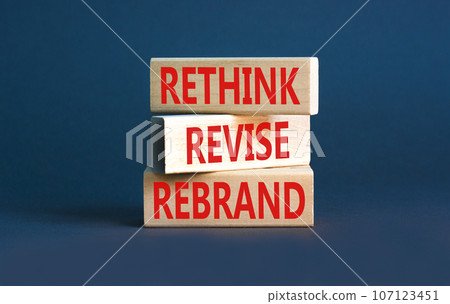 Rethink revise rebrand symbol. Concept word Rethink Revise Rebrand on beautiful block. Beautiful grey table grey background. Business brand motivational rethink revise rebrand concept. Copy space. Rethink revise rebrand symbol. Concept word Rethink Revise Rebrand on beautiful block. Beautiful grey table grey background. Business brand motivational rethink revise rebrand concept. Copy space. 107123451