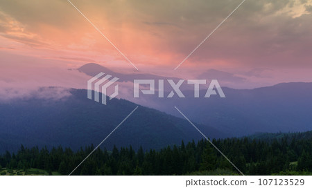 Surrealistic mountains sunset. Unusual landscape. Copy space abstract background. Surrealistic mountains sunset. Unusual landscape. Copy space abstract background. 107123529