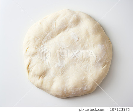 Fresh raw dough isolated on white background, top view Fresh raw dough isolated on white background, top view 107123575