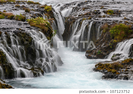Bruarfoss - Bridge Falls - detail on Iceland's Golden Circle under autumn sky. Bruarfoss - Bridge Falls - detail on Iceland's Golden Circle under autumn sky. 107123752