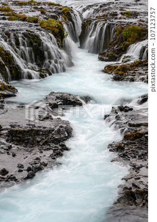 Bruarfoss - Bridge Falls - on Iceland's Golden Circle under cloudy autumn sky. Bruarfoss - Bridge Falls - on Iceland's Golden Circle under cloudy autumn sky. 107123757