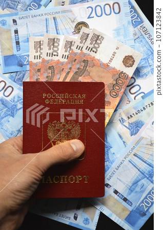 passport of a Russian citizen and 5000 Russian ruble banknotes passport of a Russian citizen and 5000 Russian ruble banknotes 107123842