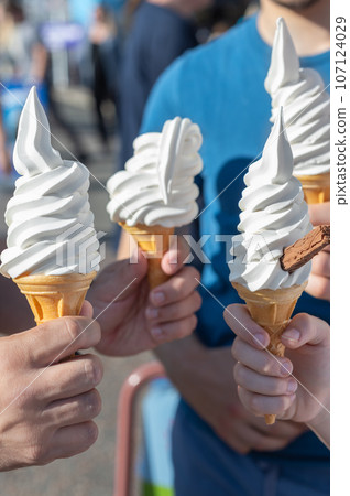 Soft vanilla ice cream with chocolate stick Soft vanilla ice cream with chocolate stick 107124029