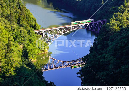 Tadami Line Summer train crossing the Daiichi Tadami River Bridge (Mishima Town, Fukushima Prefecture, early morning in mid-August) Tadami Line Summer train crossing the Daiichi Tadami River Bridge (Mishima Town, Fukushima Prefecture, early morning in mid-August) 107126233