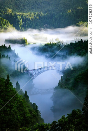 Tadami Line - The first train crossing the Daiichi Tadami River Bridge in the morning fog (Mishima Town, Fukushima Prefecture, early morning in mid-August) Tadami Line - The first train crossing the Daiichi Tadami River Bridge in the morning fog (Mishima Town, Fukushima Prefecture, early morning in mid-August) 107126256
