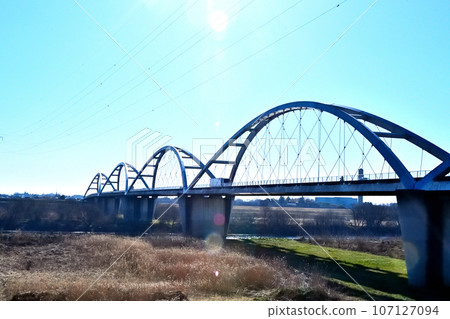 Shin-Mikuni Bridge seen from the embankment on the right bank of the Watarase River Shin-Mikuni Bridge seen from the embankment on the right bank of the Watarase River 107127094