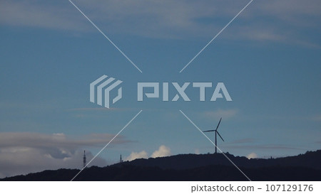 Windmill standing on the mountain ridge and early autumn morning sky / Telephoto / Sky-based / 230914am 107129176