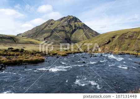 River in volcanic landscape of Fjallabak Nature Reserve in Iceland highlands. 107131449