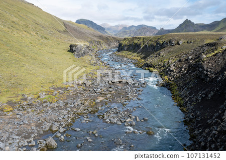 River in volcanic landscape of Fjallabak Nature Reserve in Iceland highlands. 107131452