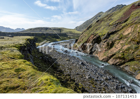 River in volcanic landscape of Fjallabak Nature Reserve in Iceland highlands. 107131453