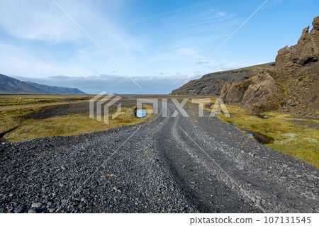 Rugged dirt and lava road in Fjallabak Nature Reserve in Iceland highlands. Rugged dirt and lava road in Fjallabak Nature Reserve in Iceland highlands. 107131545