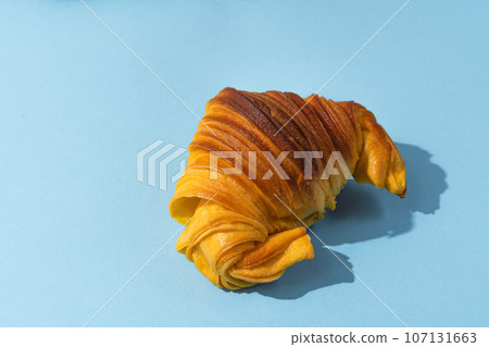 Portuguese Brioche Croissants on blue background Portuguese Brioche Croissants on blue background 107131663