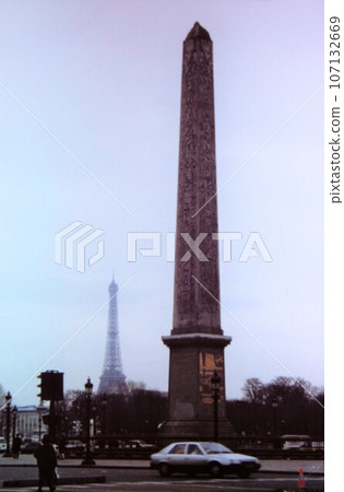 Eiffel Tower towering over Paris in France 107132669