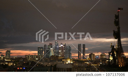 View of the monument to Peter the Great by Zurab Tsereteli in the center of the Russian capital on a summer evening View of the monument to Peter the Great by Zurab Tsereteli in the center of the Russian capital on a summer evening 107137006