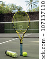 close-up. male hands holding tennis racket and balls 107137110