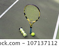 close-up. male hands holding tennis racket and balls 107137112