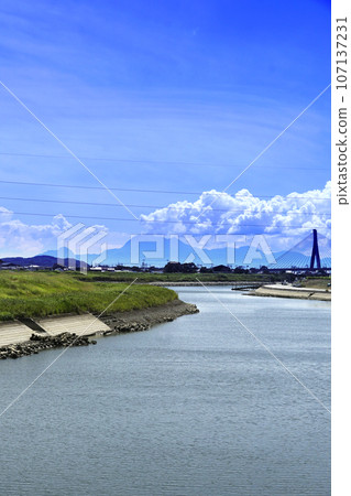 Blue sky and white clouds, Yabe River, Yabe River Bridge, and Unzen from Miyama City in August Blue sky and white clouds, Yabe River, Yabe River Bridge, and Unzen from Miyama City in August 107137231