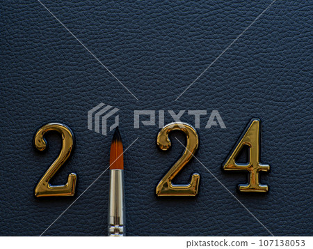 2024 on gray background with paint brush instead zero 107138053