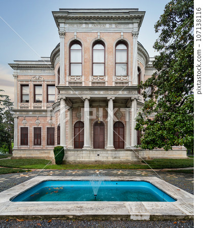 Historic Ottoman 19th century Mecidiye Pavilion, located in Beykoz, Istanbul, Turkey, with a large fountain in front 107138116