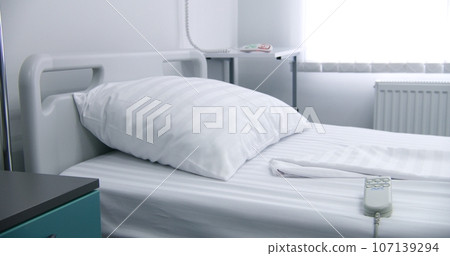 Comfortable beds and modern equipment in medical facility Comfortable beds and modern equipment in medical facility 107139294
