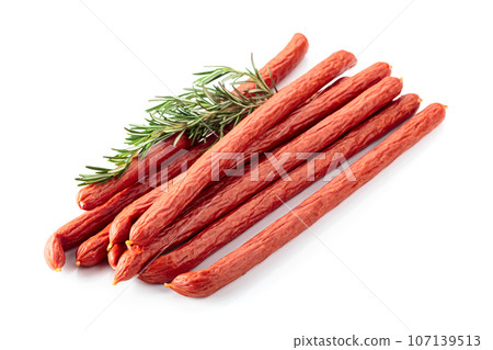 Smocked sausages with rosemary isolated on white. 107139513