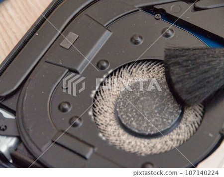 cleaning the cooler with a brush, close-up cleaning the cooler with a brush, close-up 107140224