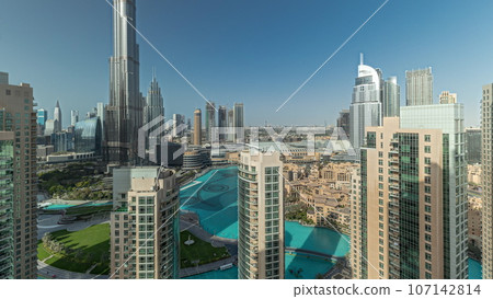 Panorama showing Dubai Downtown cityscape with tallest skyscrapers around aerial. 107142814