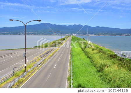 Scenery of the reclamation embankment road in Isahaya Bay, Nagasaki Prefecture (September 2022) Scenery of the reclamation embankment road in Isahaya Bay, Nagasaki Prefecture (September 2022) 107144126
