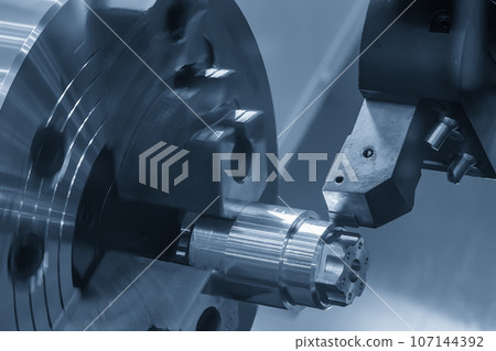 The CNC lathe machine forming cutting the metal shaft parts. The CNC lathe machine forming cutting the metal shaft parts. 107144392