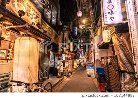 Tokyo cityscape in Japan September. Free from the coronavirus, looking out over Suzuran Dori, a bar area right next to Sangenjaya Station. Tokyo cityscape in Japan September. Free from the coronavirus, looking out over Suzuran Dori, a bar area right next to Sangenjaya Station. 107144992