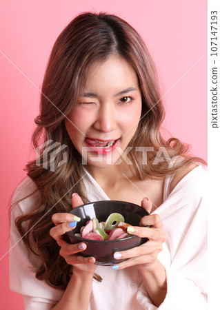 Hand Holding Sweet Hand Holding Sweet 107147193