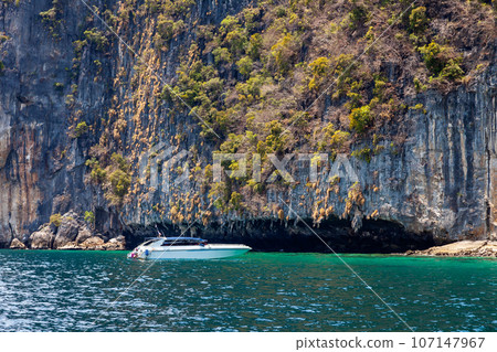 island phi phi leh and boat in thailand andaman sea. travel during vacation to the hot countries of asia. 107147967