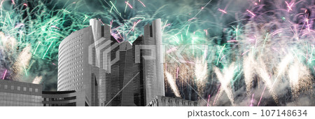 Celebratory fireworks over the Skyscrapers La Defense, commercial and business center of Paris, France Celebratory fireworks over the Skyscrapers La Defense, commercial and business center of Paris, France 107148634