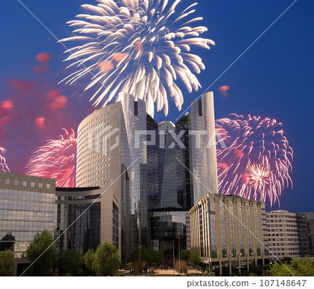 Celebratory fireworks over the Skyscrapers La Defense, commercial and business center of Paris, France Celebratory fireworks over the Skyscrapers La Defense, commercial and business center of Paris, France 107148647