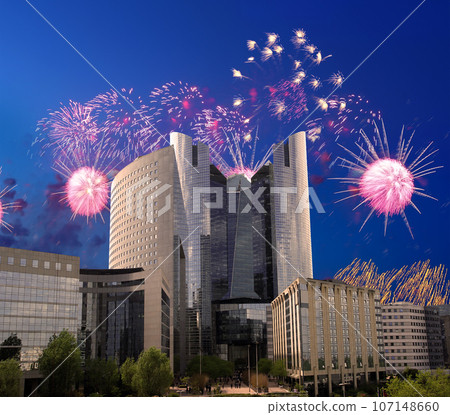 Celebratory fireworks over the Skyscrapers La Defense, commercial and business center of Paris, France Celebratory fireworks over the Skyscrapers La Defense, commercial and business center of Paris, France 107148660