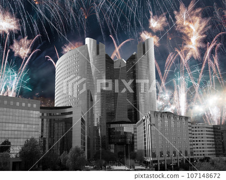 Celebratory fireworks over the Skyscrapers La Defense, commercial and business center of Paris, France Celebratory fireworks over the Skyscrapers La Defense, commercial and business center of Paris, France 107148672