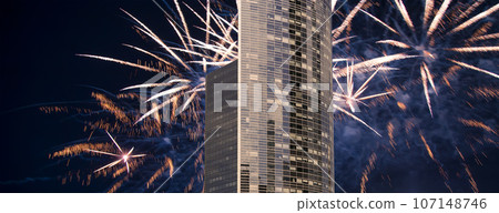 Celebratory fireworks over the Skyscrapers La Defense, commercial and business center of Paris, France Celebratory fireworks over the Skyscrapers La Defense, commercial and business center of Paris, France 107148746