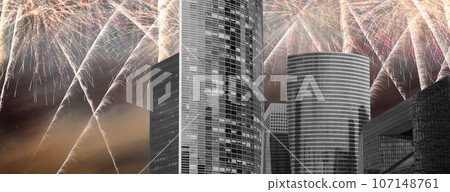 Celebratory fireworks over the Skyscrapers La Defense, commercial and business center of Paris, France Celebratory fireworks over the Skyscrapers La Defense, commercial and business center of Paris, France 107148761