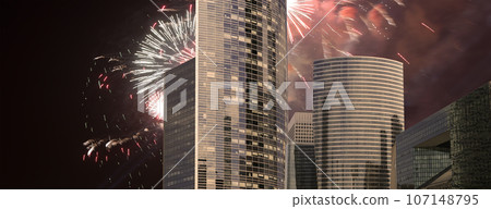 Celebratory fireworks over the Skyscrapers La Defense, commercial and business center of Paris, France Celebratory fireworks over the Skyscrapers La Defense, commercial and business center of Paris, France 107148795