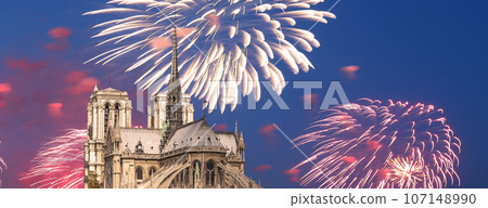 Celebratory fireworks over the Notre Dame de Paris, also known as Notre Dame Cathedral or simply Notre Dame, is a Gothic, Roman Catholic cathedral of Paris, France Celebratory fireworks over the Notre Dame de Paris, also known as Notre Dame Cathedral or simply Notre Dame, is a Gothic, Roman Catholic cathedral of Paris, France 107148990