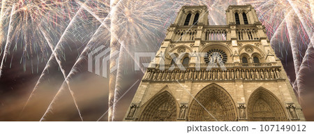 Celebratory fireworks over the Notre Dame de Paris, also known as Notre Dame Cathedral or simply Notre Dame, is a Gothic, Roman Catholic cathedral of Paris, France Celebratory fireworks over the Notre Dame de Paris, also known as Notre Dame Cathedral or simply Notre Dame, is a Gothic, Roman Catholic cathedral of Paris, France 107149012